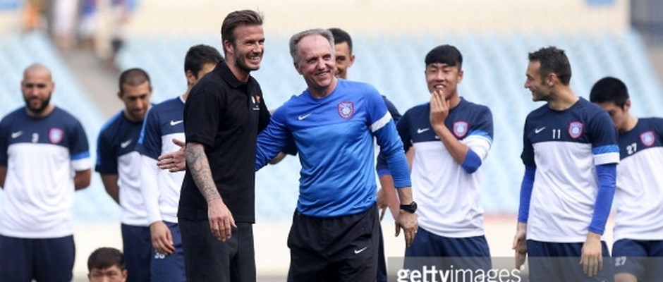 18.6.2013., David Beckham talks with Jiangsu Sainty head coach Dragan Okuka during a training session...